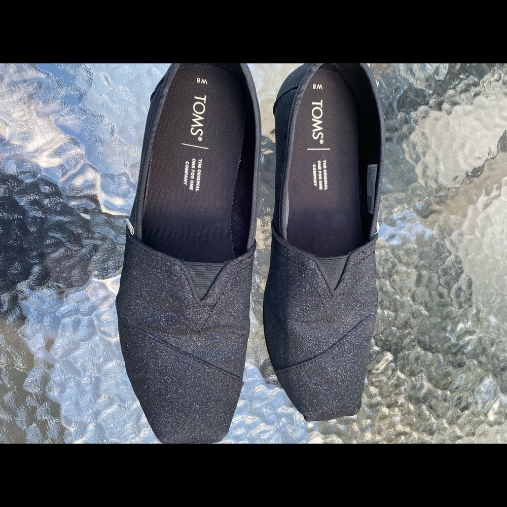 Tom’s navy slip on shoes